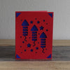 red and blue card with rockets and stars