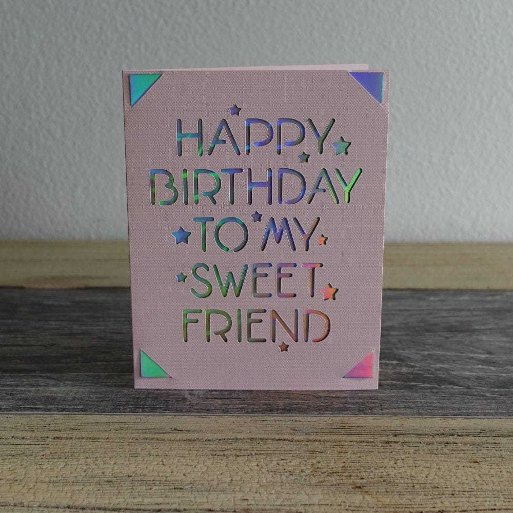 Pink card that says happy birthday to my sweet friend